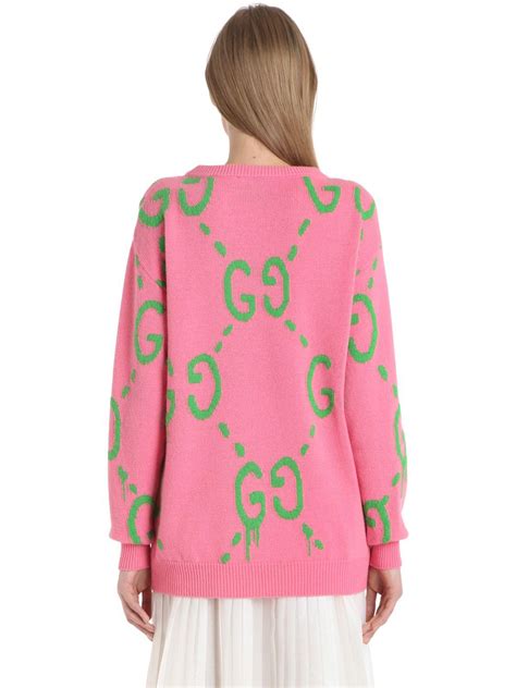 gucci pink sweater.